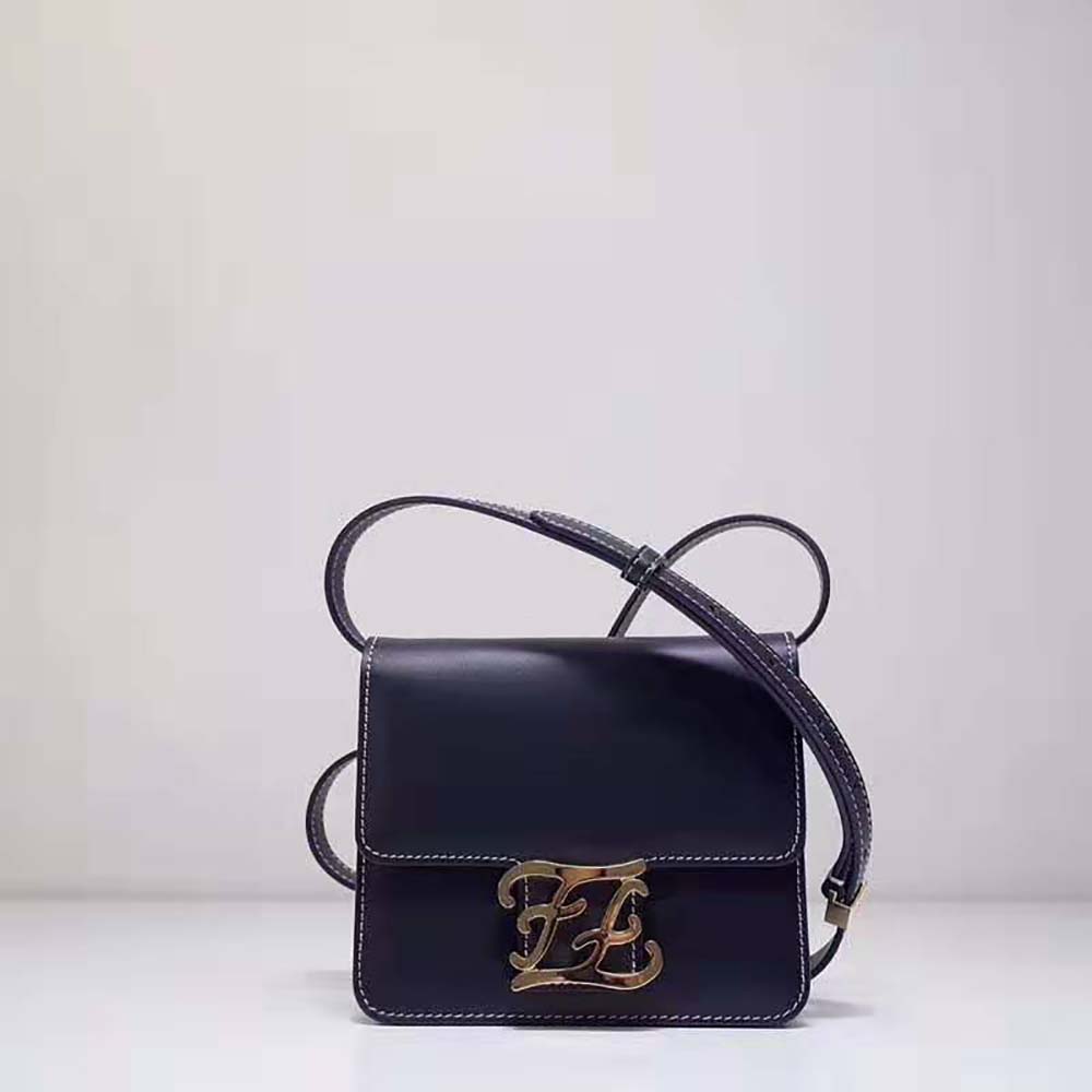 Close-up of gold-tone hardware on Fendi Women Kaligraphy Black Leather Bag
