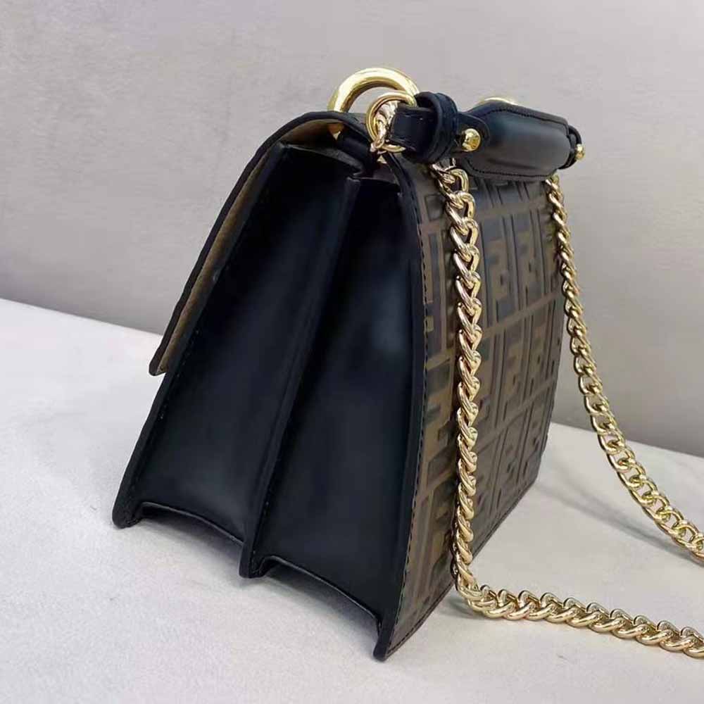 Side view of Fendi Women Kan U Small Brown Leather Mini-Bag with strap