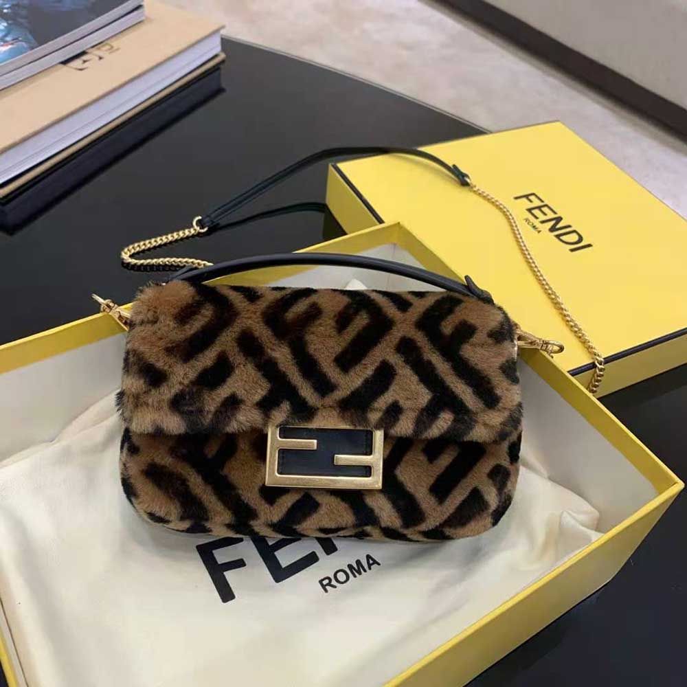 Close-up of soft sheepskin texture on Fendi Mini Baguette brown bag
