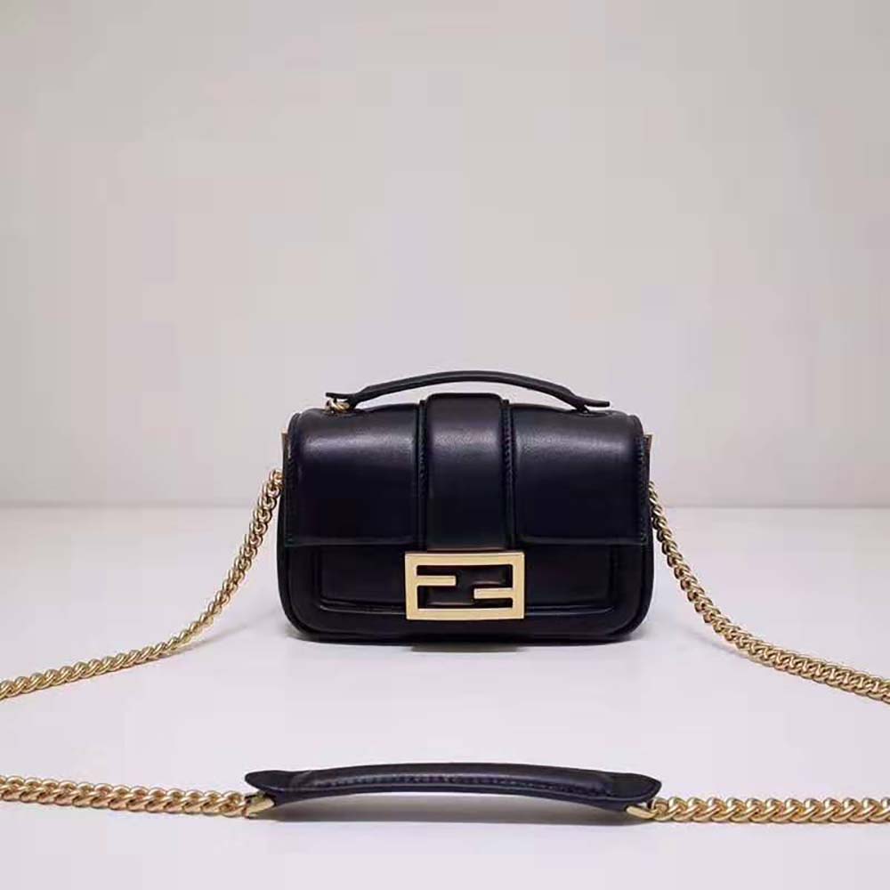 Close-up of gold chain strap detail on Fendi Women Mini Baguette Chain Black Nappa Leather Bag