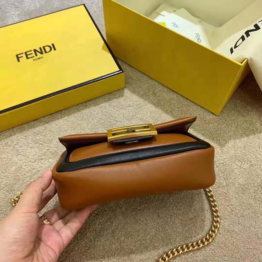 Side profile showing silhouette of Fendi Women Mini Baguette Chain Brown and Black Nappa Leather Bag