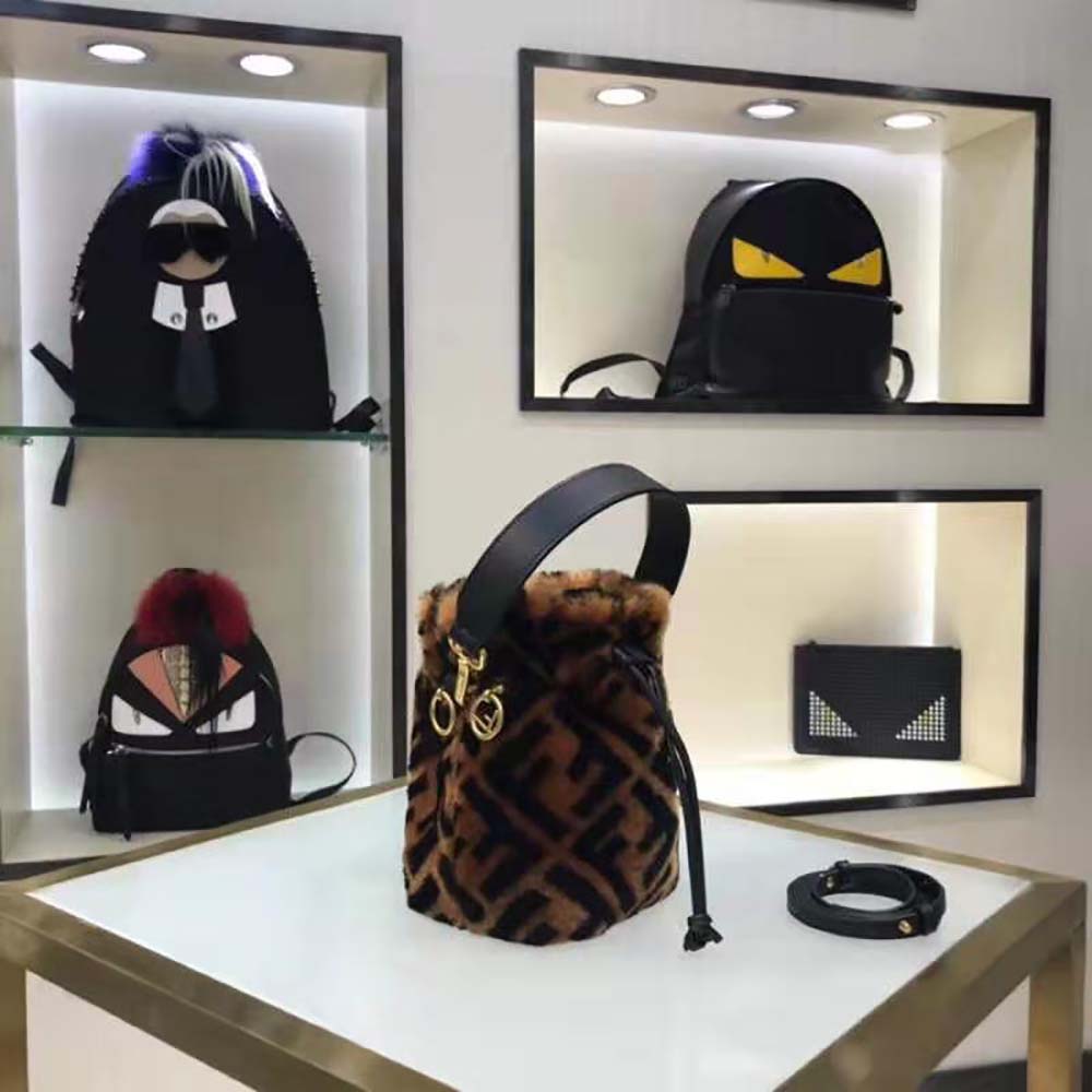 Side angle showing adjustable strap on Fendi Mon Tresor Mini-Bag
