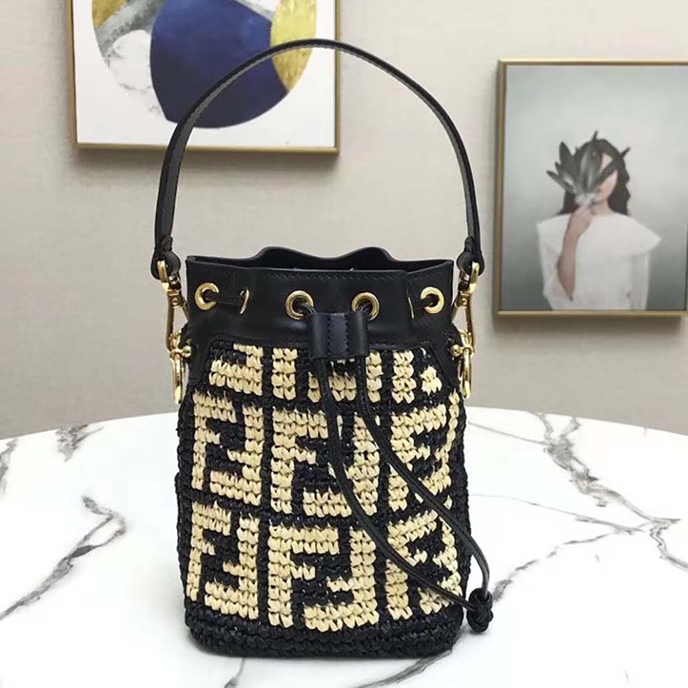 Close-up of gold hardware detail on Fendi Women Mon Tresor Raffia Mini-Bag-Black