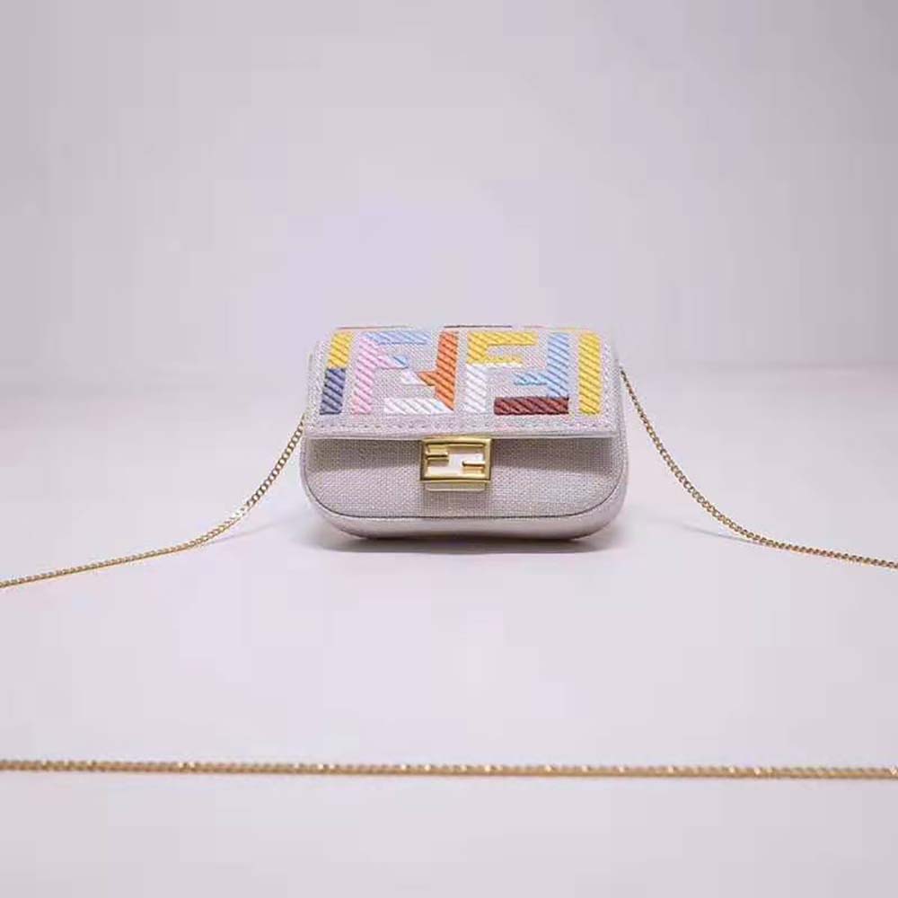 Close-up of gold-tone hardware on Fendi Women Nano Baguette Charm