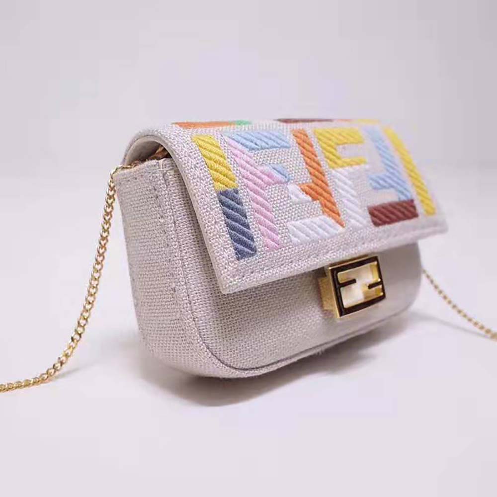 Side profile showing compact size of Fendi Women Nano Baguette Charm
