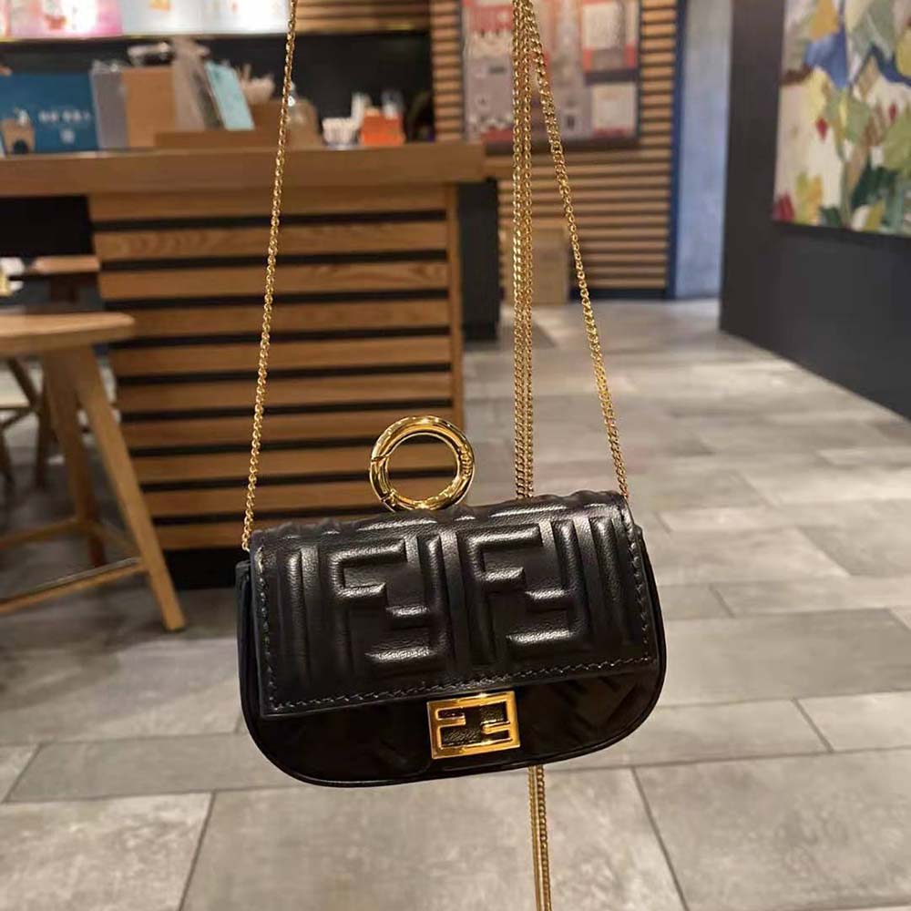 Close-up of gold-tone hardware on Fendi Women Nano Baguette Charm