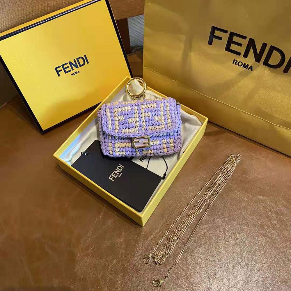 Close-up of the raffia texture and signature Fendi charm detail