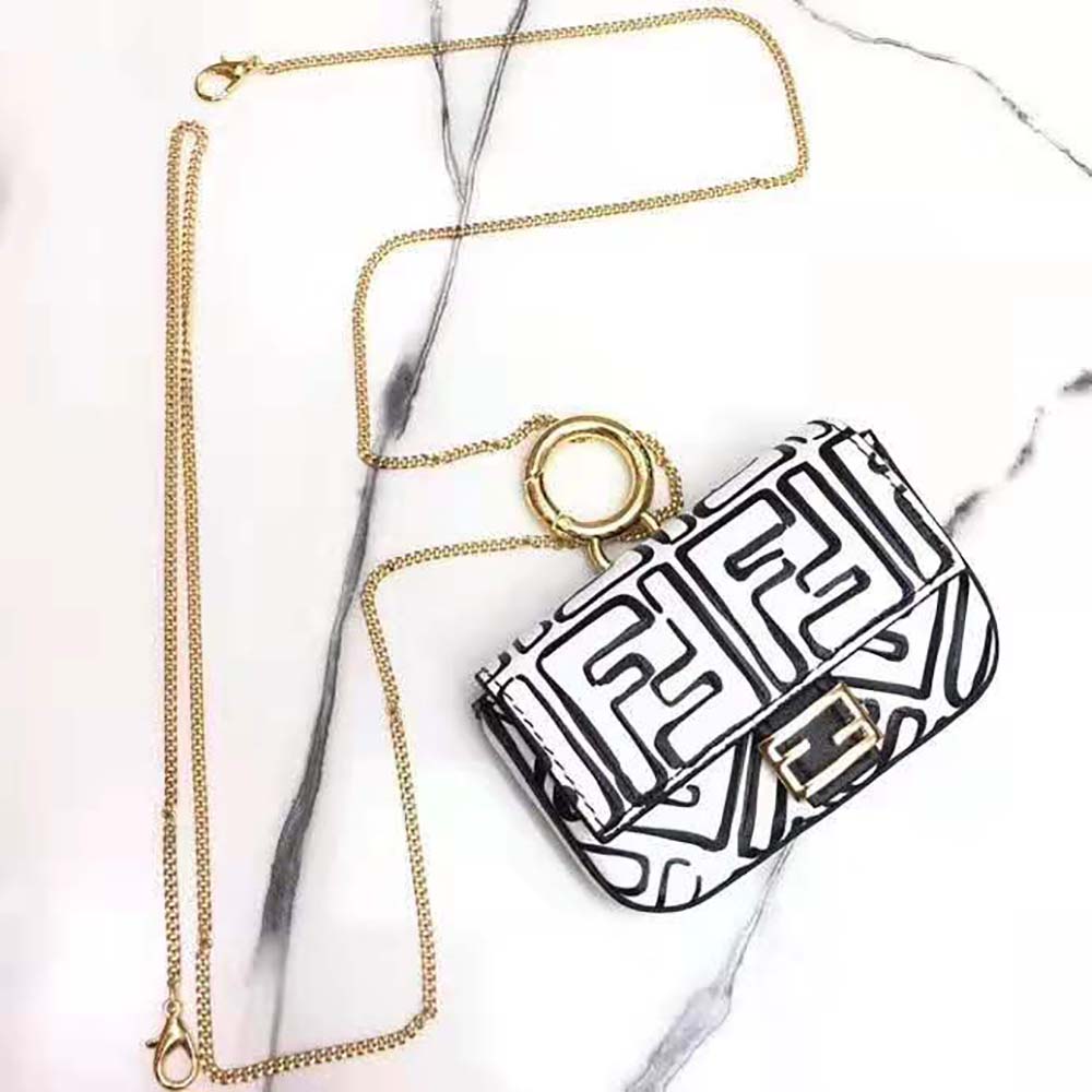 Close-up of gold-tone hardware on Fendi Women Nano Baguette Charm