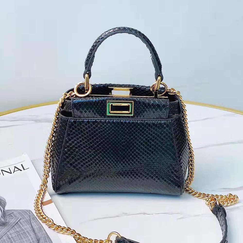Close-up of black python texture and gold hardware on Fendi Peekaboo Mini