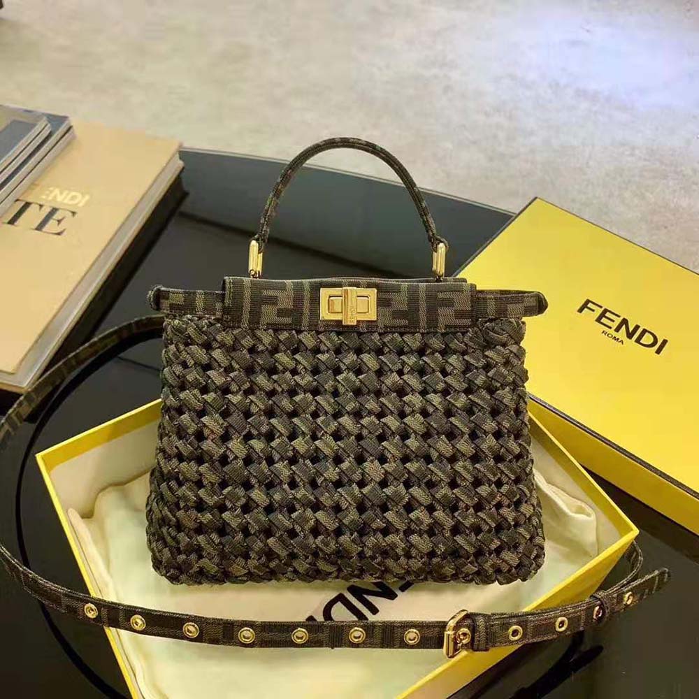 Close-up of signature interlace hardware on Fendi Peekaboo Iconic Mini Bag