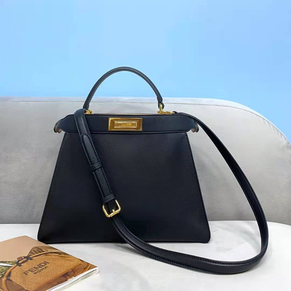 Side angle highlighting leather texture of Fendi Women Peekaboo Iseeu Medium Leather Bag-Black