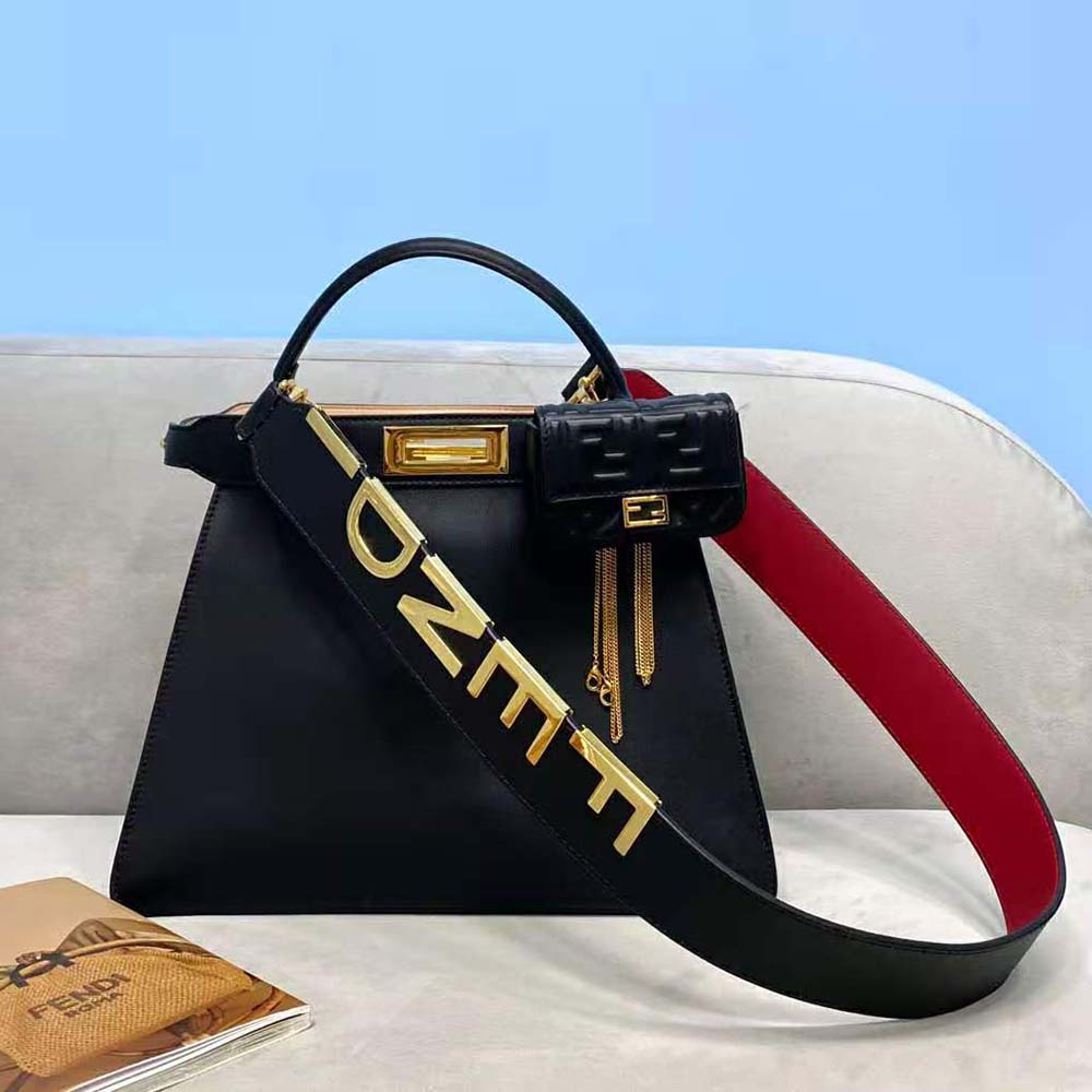 Close-up of gold-tone hardware on Fendi Women Peekaboo Iseeu Medium Leather Bag-Black