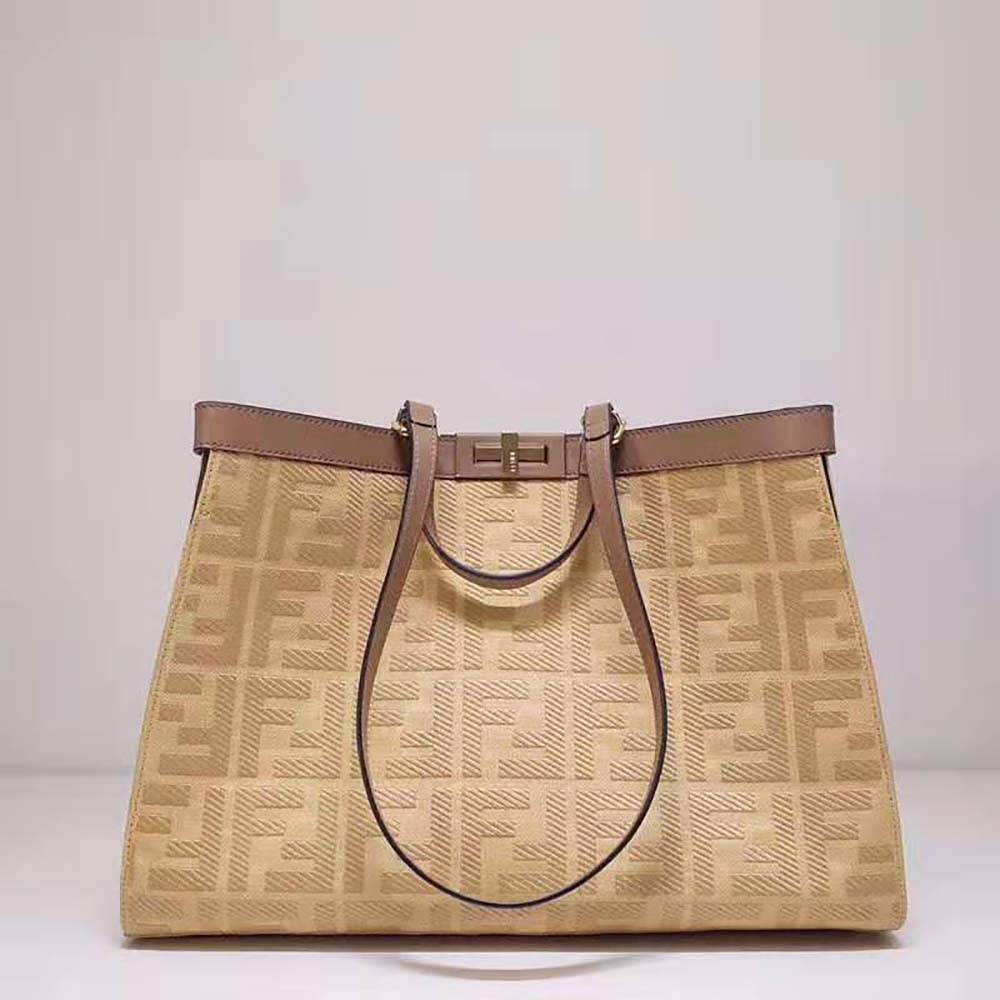 Side profile showing spacious interior of Fendi Women Peekaboo X-Tote Bag