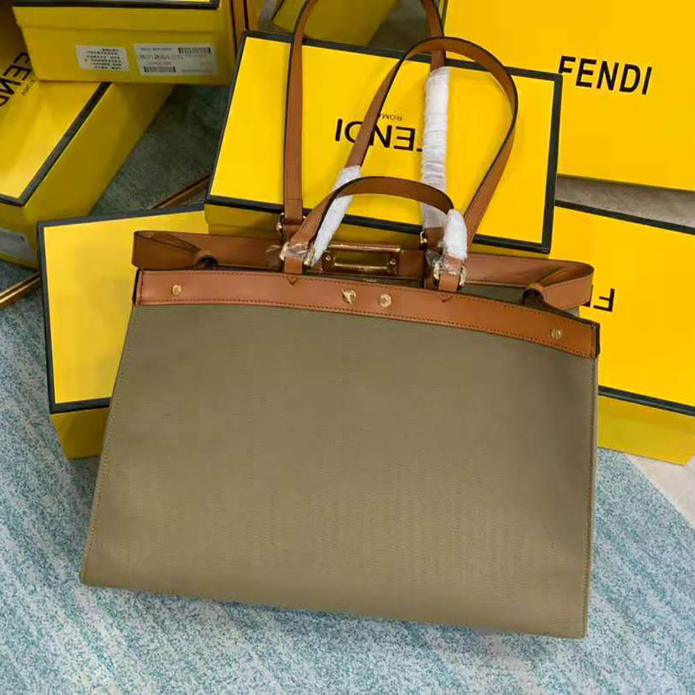 Side angle showing spacious interior of Fendi Women Peekaboo X-Tote Green Canvas Bag