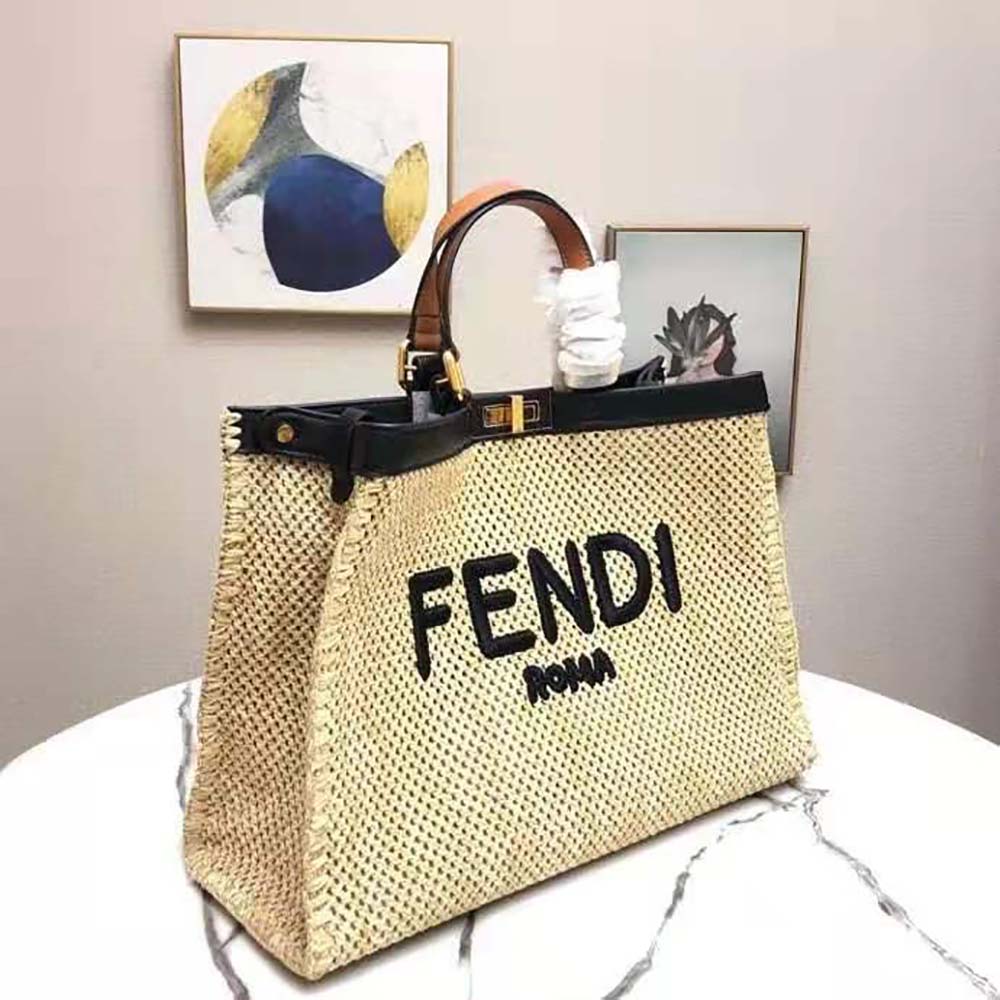 Side angle showing spacious interior of Fendi Women Peekaboo X-Tote