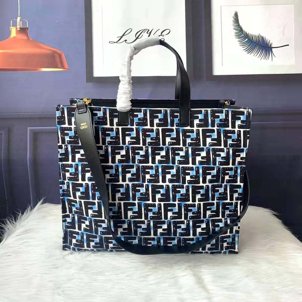 Close-up of gold-tone hardware on Fendi Women Shopper Glazed Canvas FF Bag