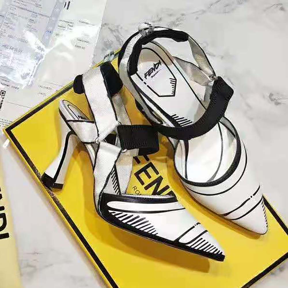 Angled shot highlighting 85 mm heel and white leather texture
