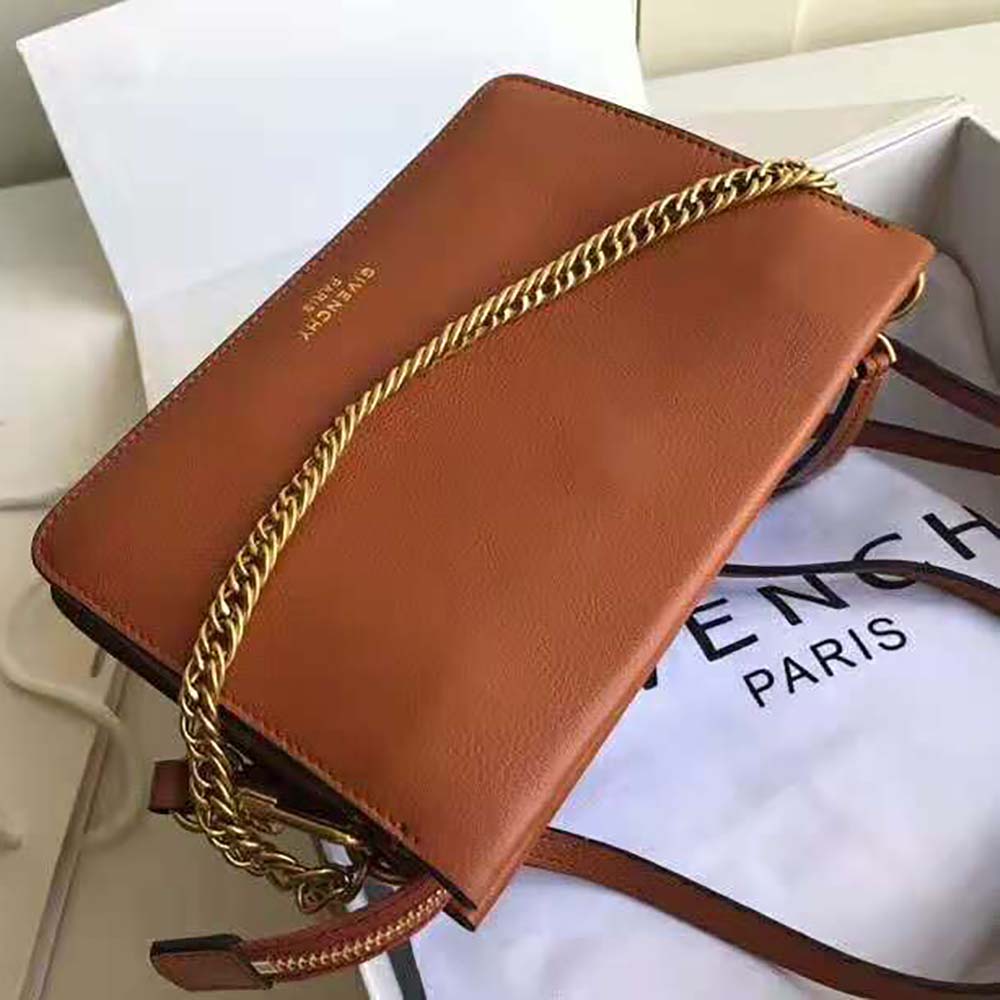 Close-up of silver hardware on Givenchy Women Cross3 Bag brown leather