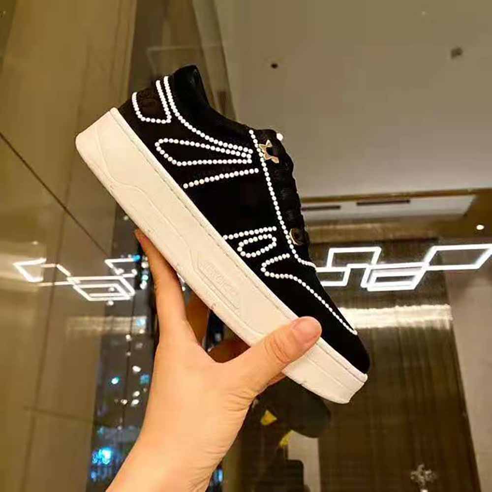 Close-up of pearl embellishments on Jimmy Choo Women Hawaii/F Black Suede Sneakers