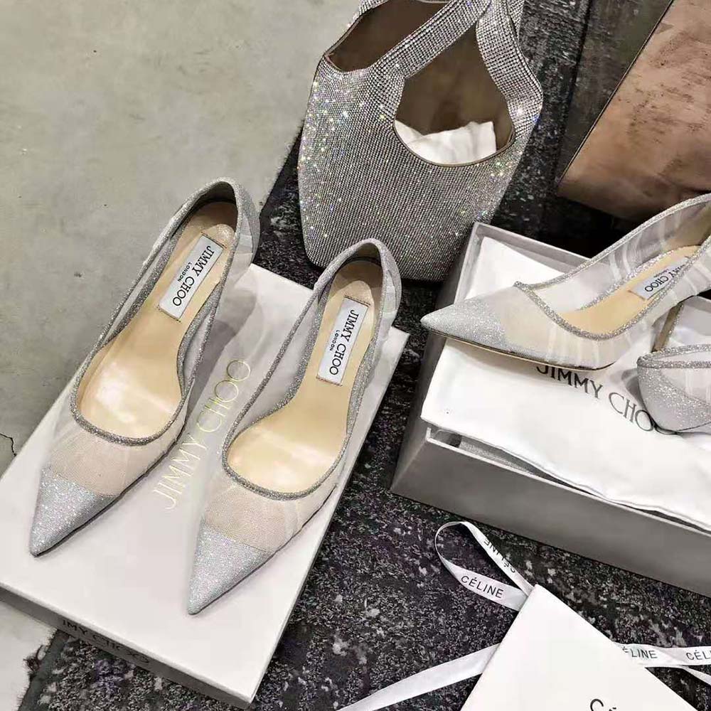 Close-up of glitter fabric and ivory tulle overlay on Jimmy Choo Love 100 pumps
