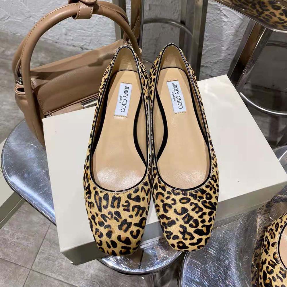 Close-up of JC emblem and leopard print on Jimmy Choo Mirele Flats