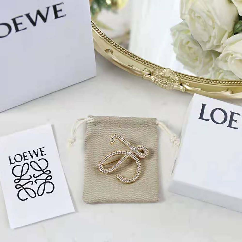 Loewe Women Brooch in Metal and Pearls pinned on white blazer lapel