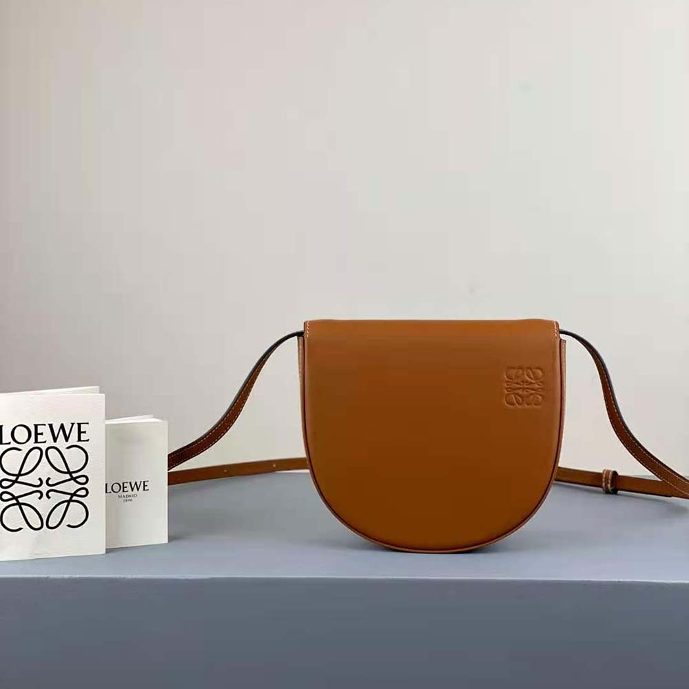 Close-up of gold-tone hardware and magnetic closure on Loewe Women Heel Bag