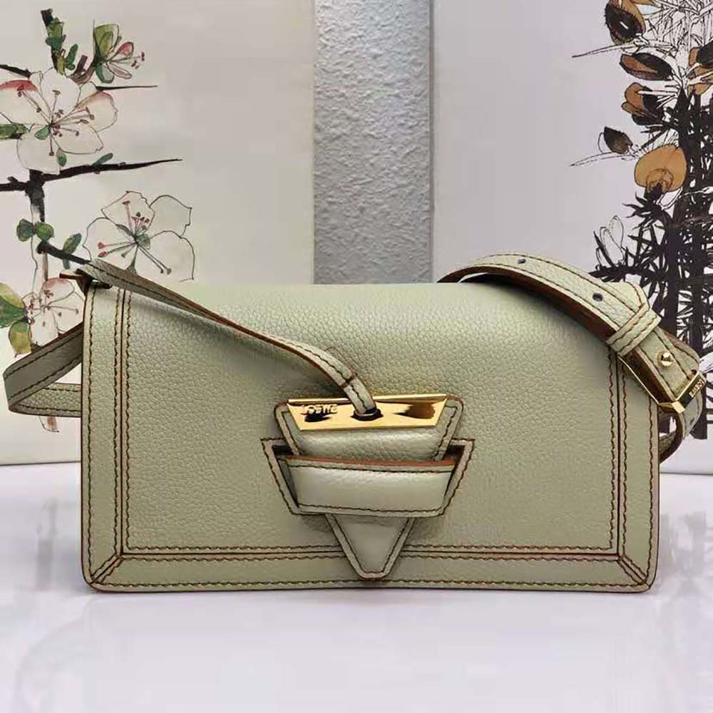 Side angle showing gold hardware on Loewe Mini Barcelona Soft Bag