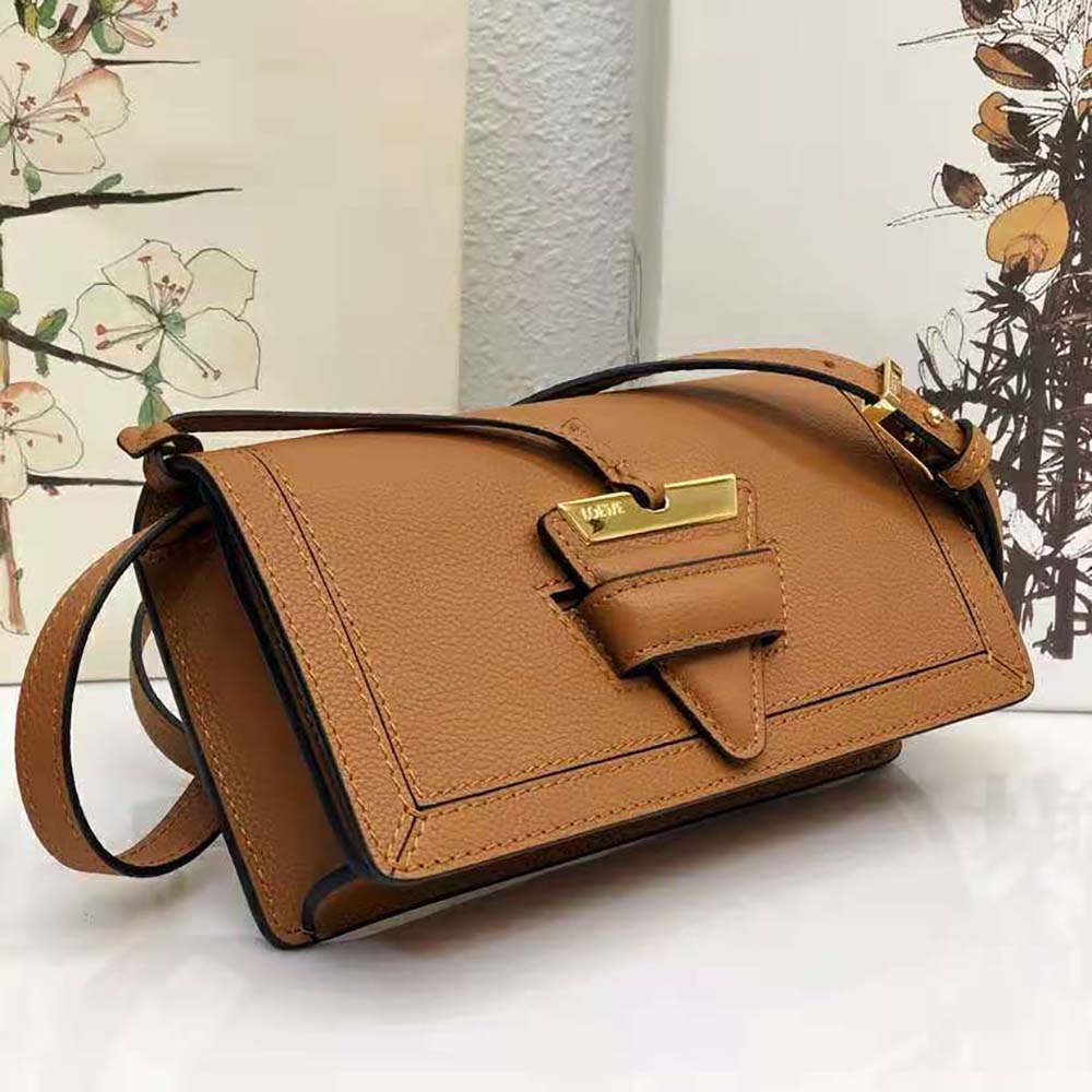 Side angle showing soft silhouette and adjustable strap of Loewe Mini Barcelona Bag
