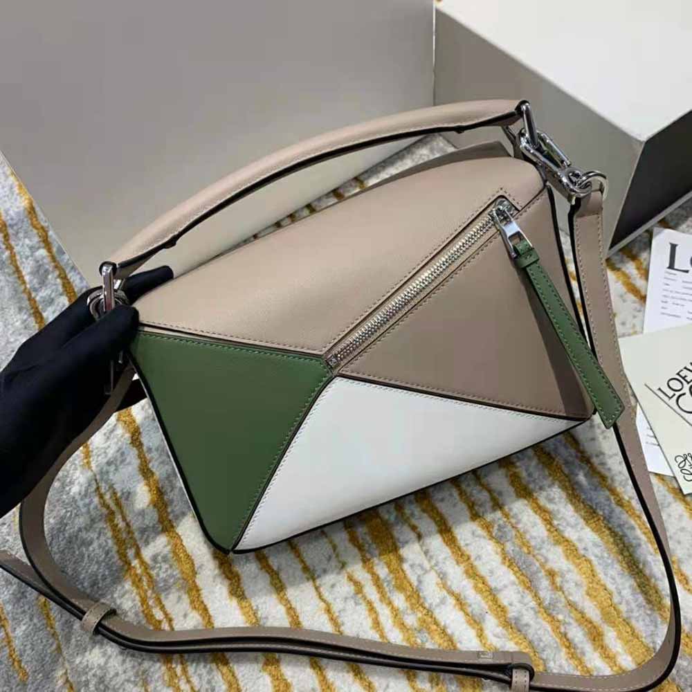Side angle showing geometric silhouette of Loewe Women Puzzle Bag