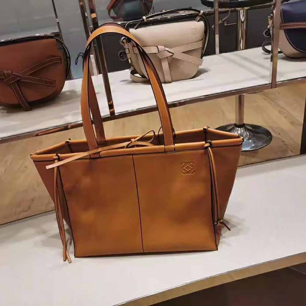 Close-up on gold-tone hardware detail of Loewe Women Small Cushion Tote Bag