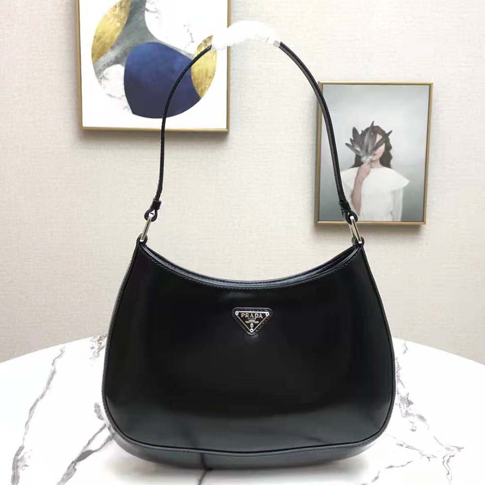 Close-up of polished hardware on Prada Cleo Brushed Leather Shoulder Bag-Black