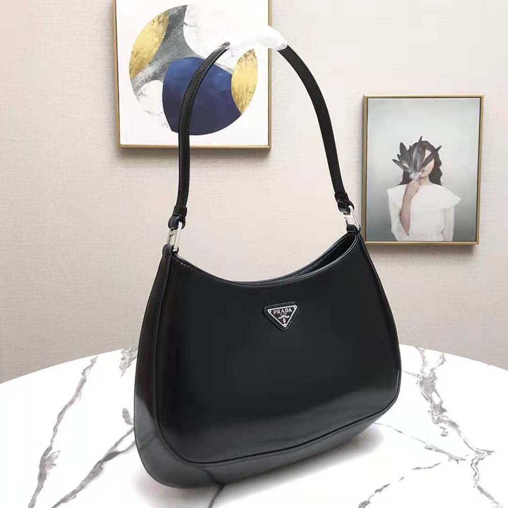 Side angle highlighting brushed leather texture on Prada Cleo Shoulder Bag