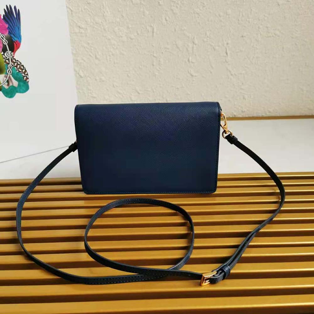 Side angle showing strap and structured silhouette of Prada Ladies Mini Bag