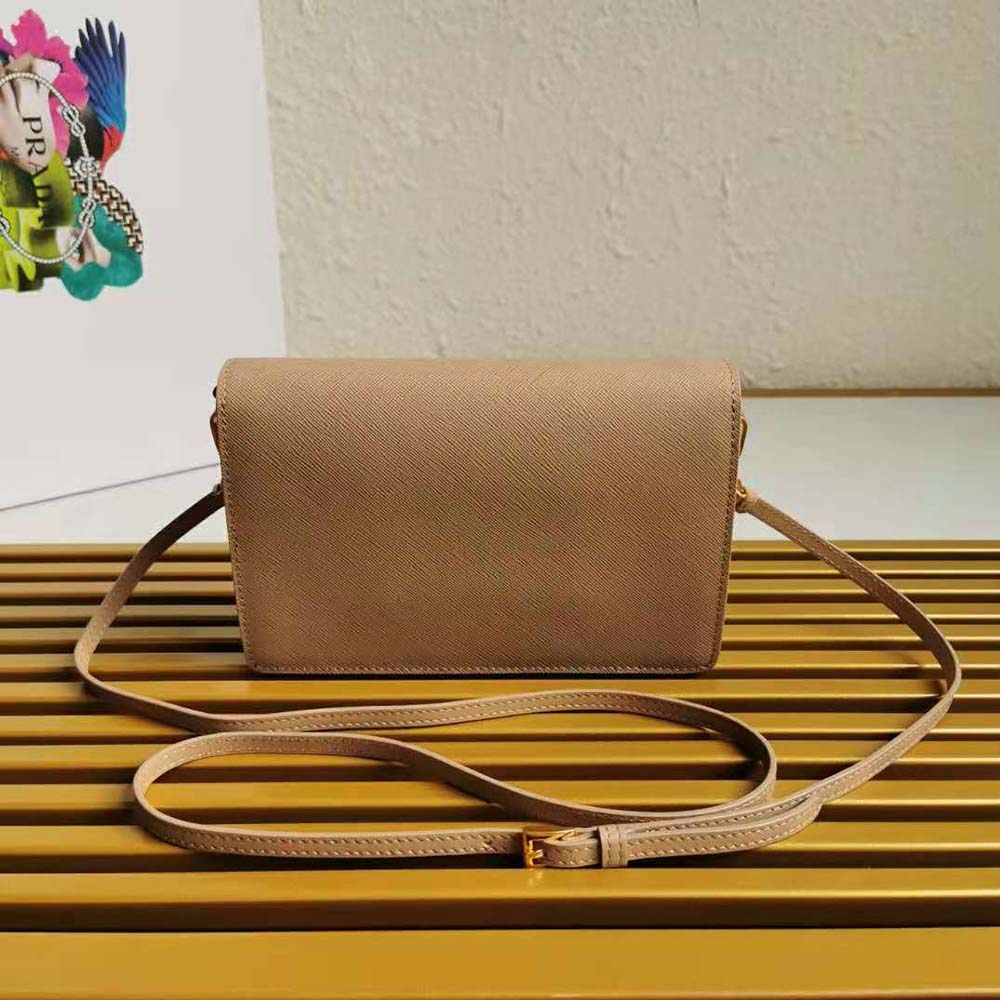 Side profile highlighting silhouette of Prada Ladies Saffiano Leather Mini Bag-Sandy