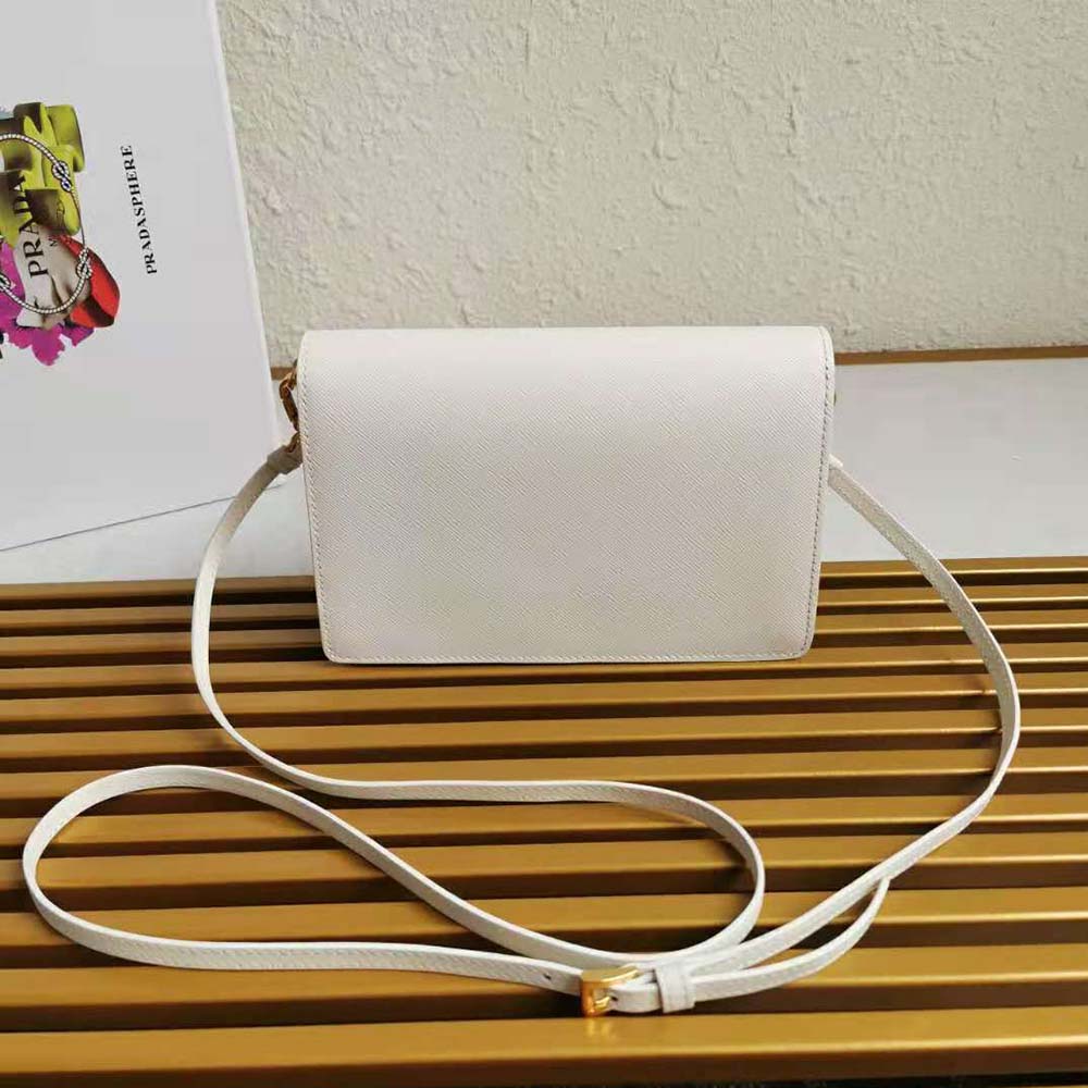 Side angle showing adjustable strap of Prada Ladies Saffiano Leather Mini Bag-White