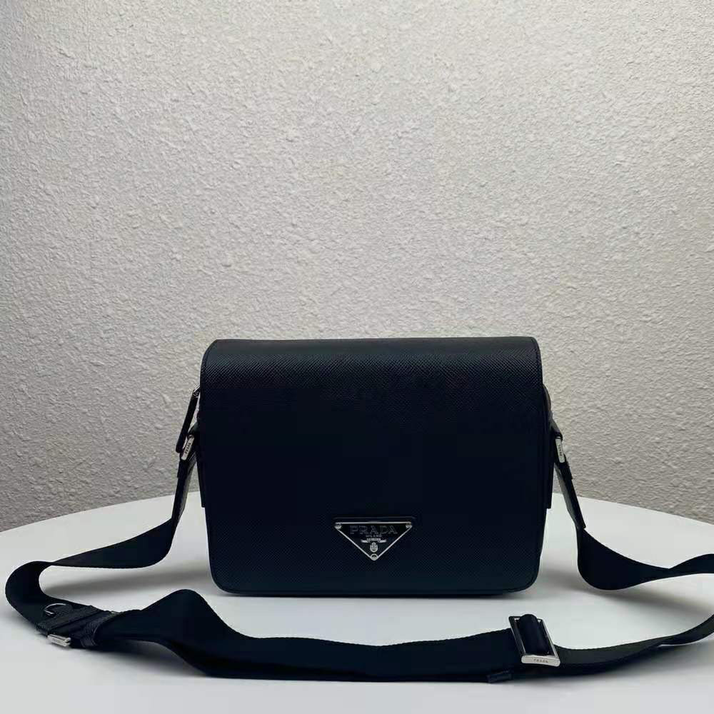 Close-up of black saffiano leather texture on Prada men bag