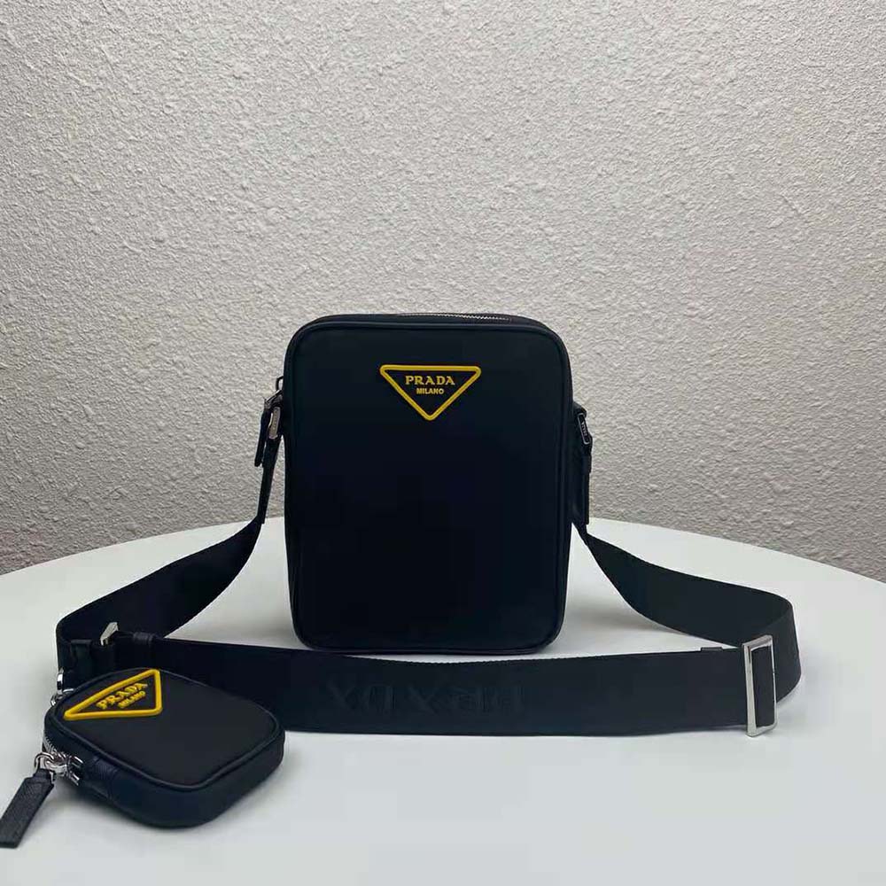 Side angle showing adjustable strap and silver hardware on Prada bag