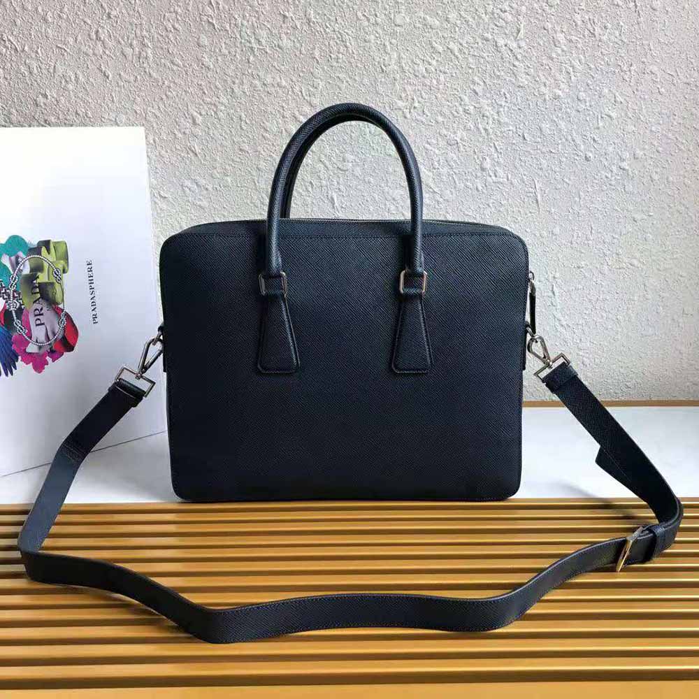 Side angle highlighting zipper and handle details on Prada Men Saffiano Leather Briefcase-Navy