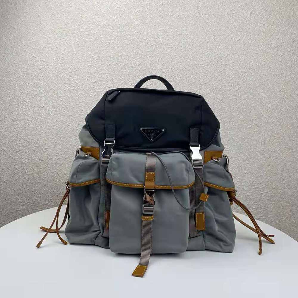 Close-up of silver hardware and logo on Prada Men Technical Fabric Nylon Backpack-Silver