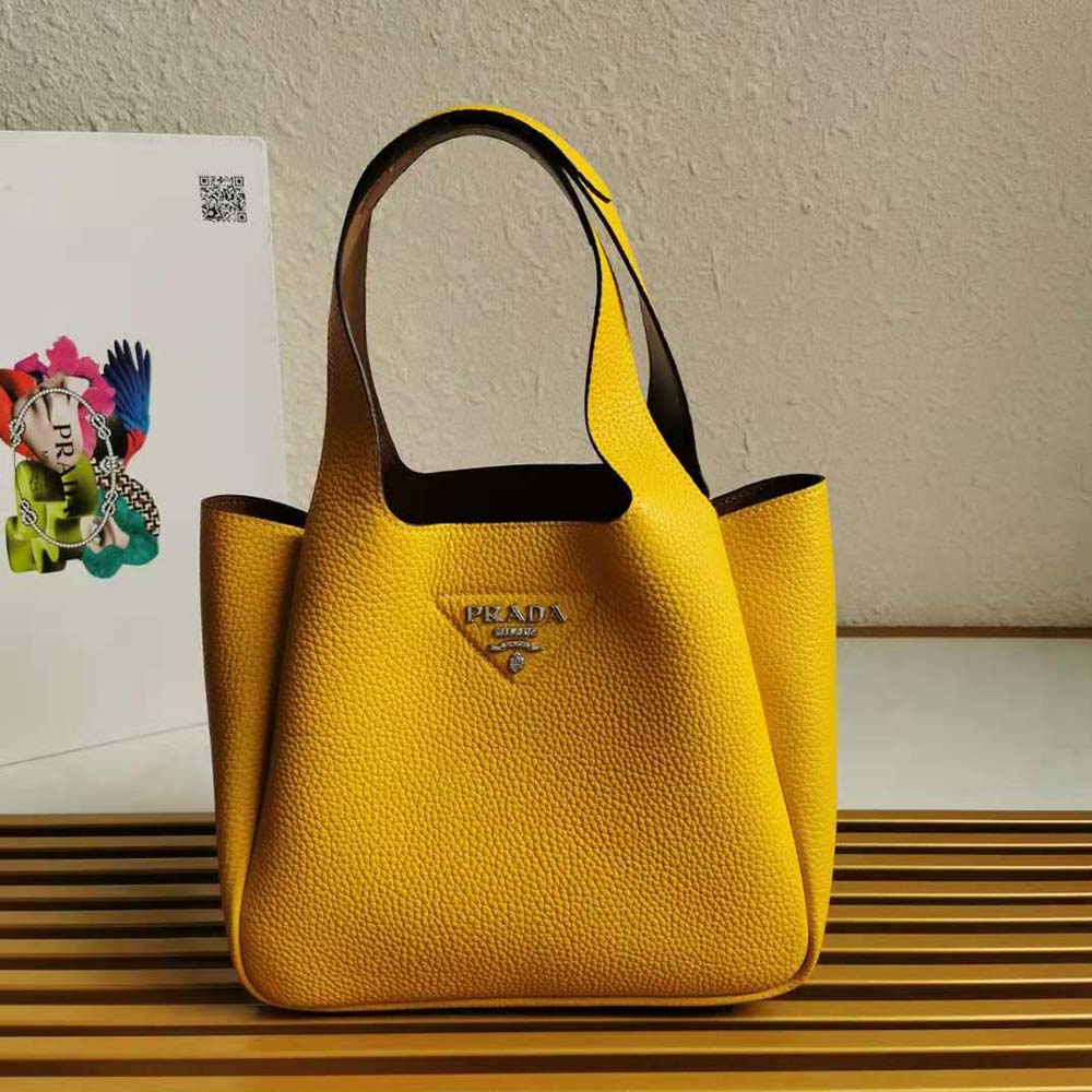 Close-up of gold-tone hardware on Prada Women Calf Leather Handbag-Yellow