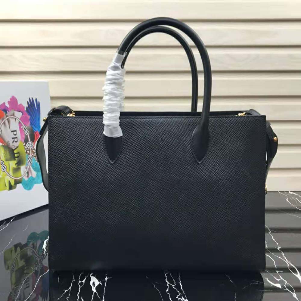 Side view highlighting structured silhouette of Prada Women Large Saffiano Leather Handbag-Black