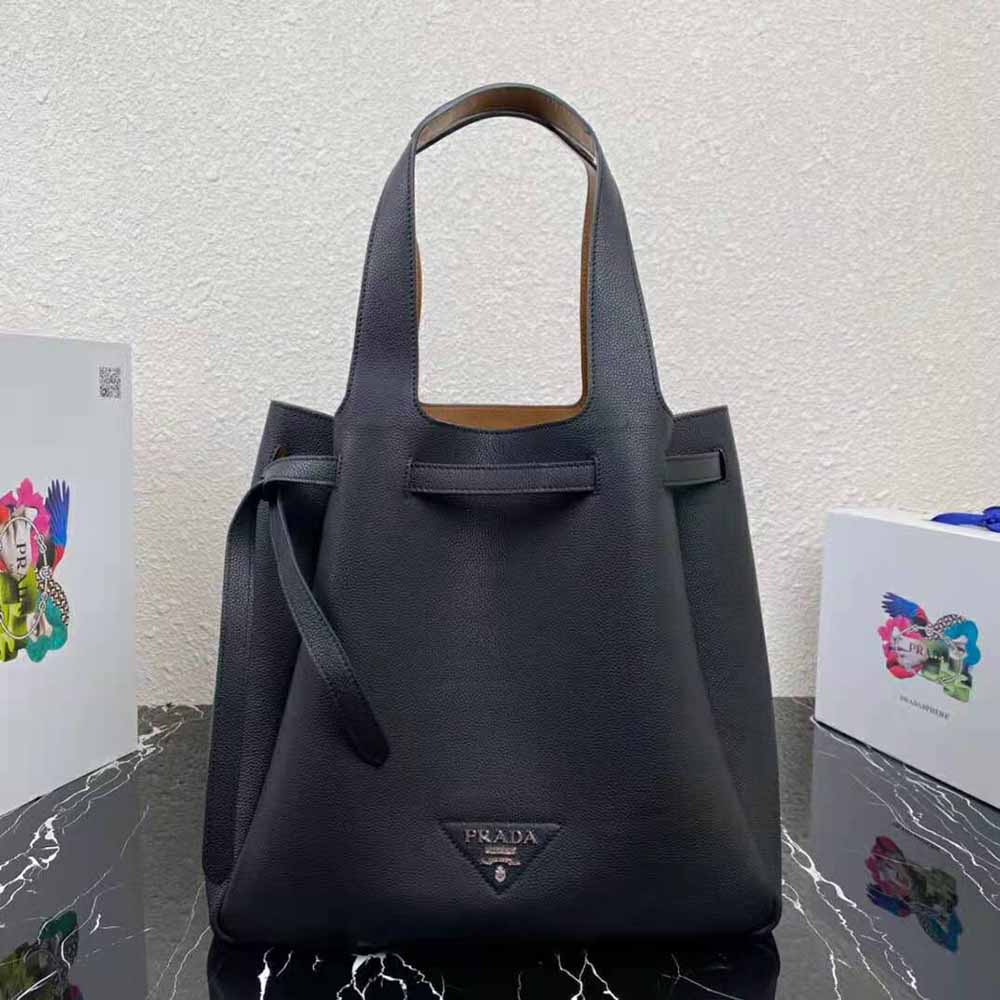 Close-up of silver-tone hardware on Prada Women Leather Tote Handle Bag-Black