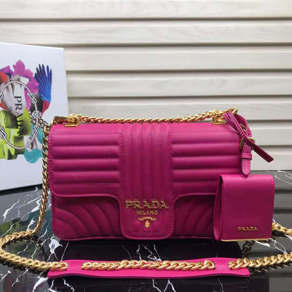 Close-up of gold-tone closure and Prada logo on Prada Women Medium Leather Prada Diagramme Bag-Rose