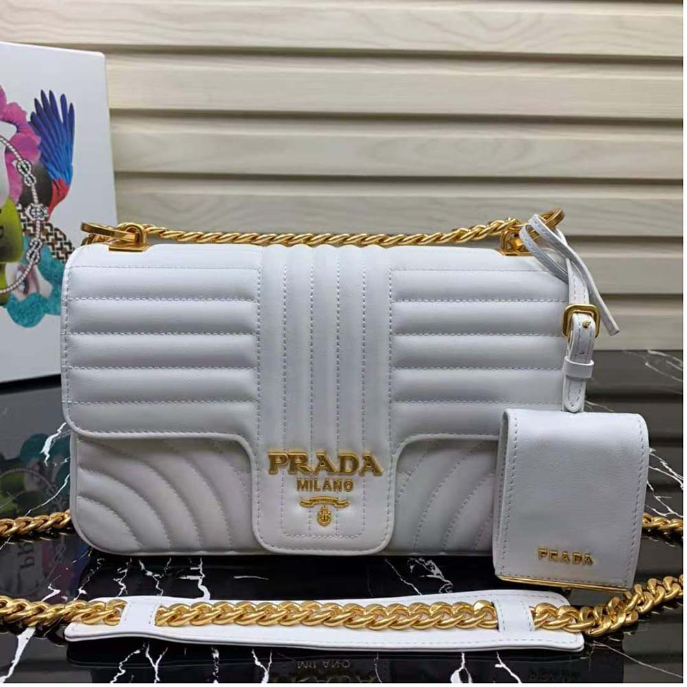 Close-up on gold-tone hardware of Prada Women Medium Leather Prada Diagramme Bag-White