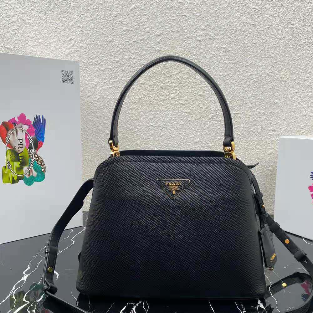 Close-up of gold-tone hardware on Prada Women Medium Saffiano Leather Prada Matinee Bag-Black