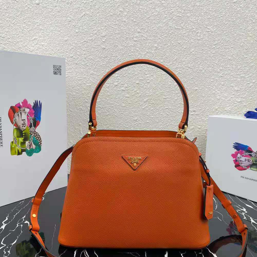 Close-up of gold-tone hardware and zipper on Prada Matinee Bag-Orange