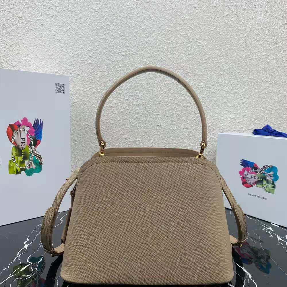 Side angle showing hardware and zip closure on Prada Matinee Bag