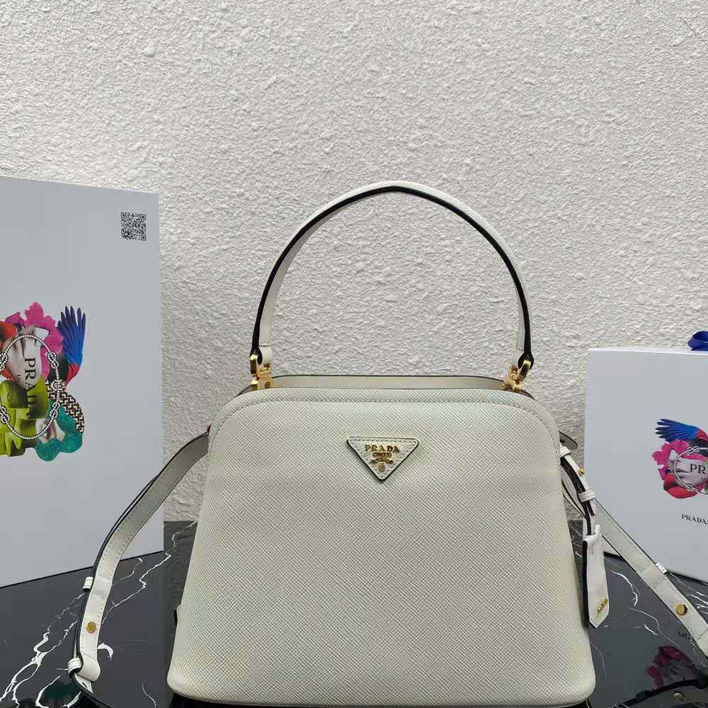 Close-up of silver hardware on Prada Women Medium Saffiano Leather Prada Matinee Bag-White