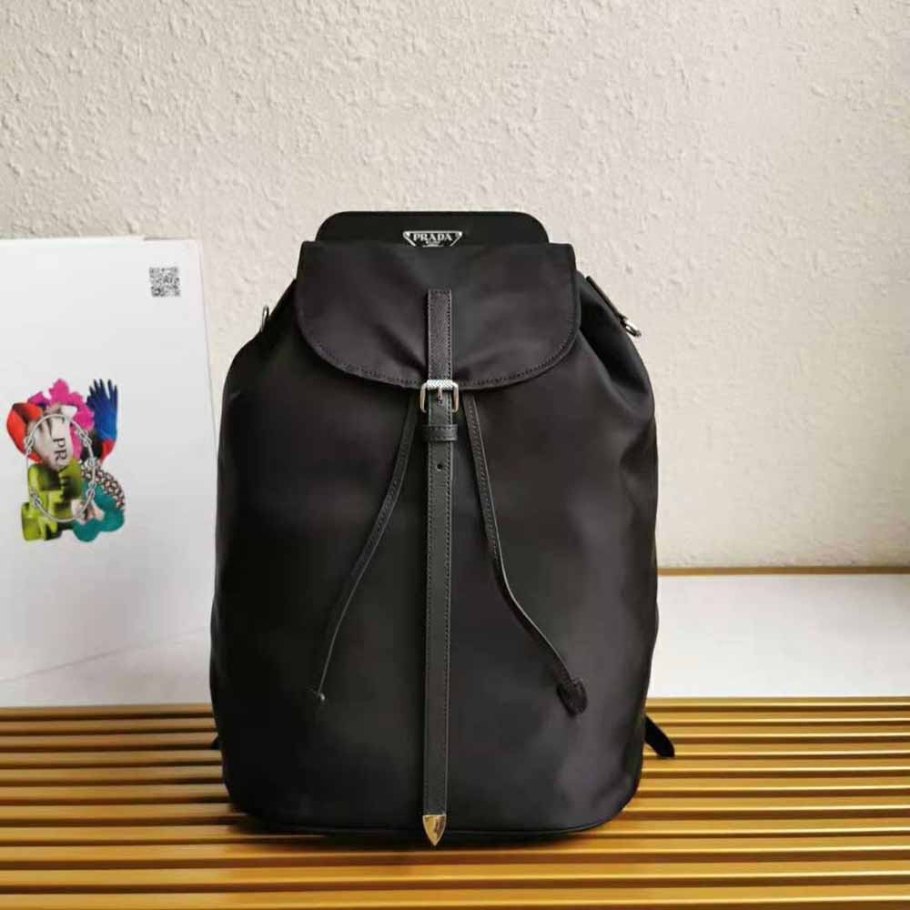 Close-up on saffiano leather and silver hardware of Prada Women Nylon and Saffiano Leather Backpack-Black